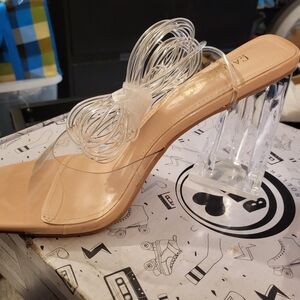 Clear high heel shoes
